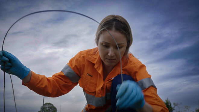 Engineer measuring groundwater